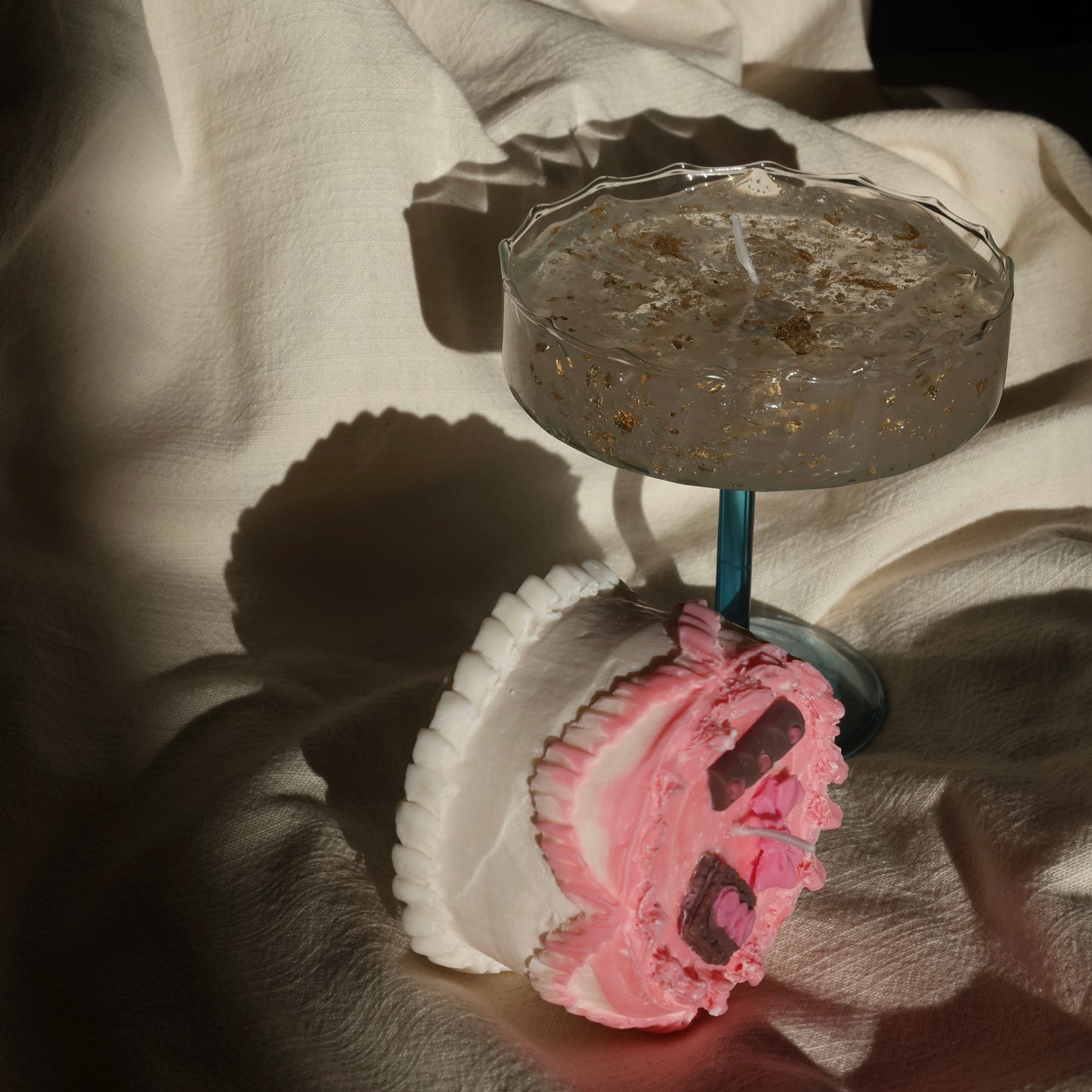Artistic gel candle in a vintage cocktail glass with golden flakes by Lily Glow Decor