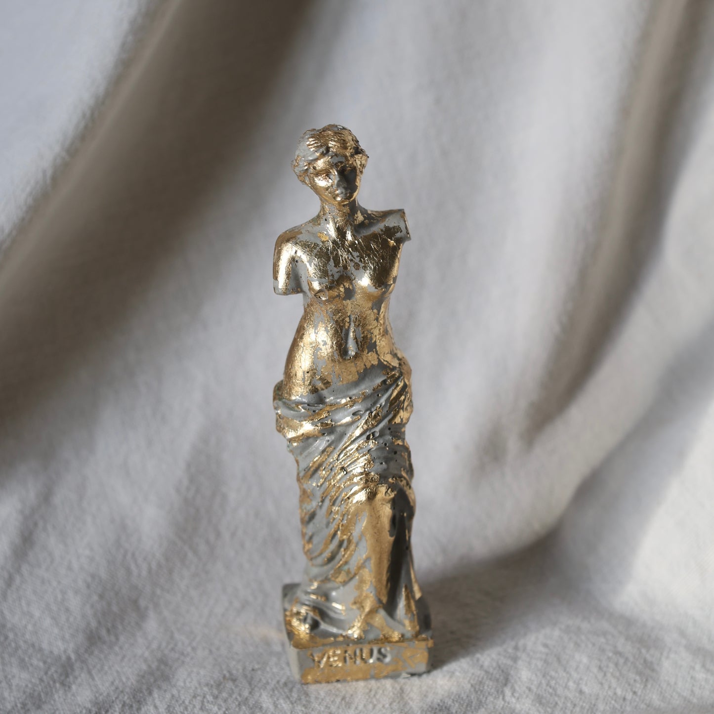 Gold-accented Venus by Lily Glow Decor figurine captured in soft natural light