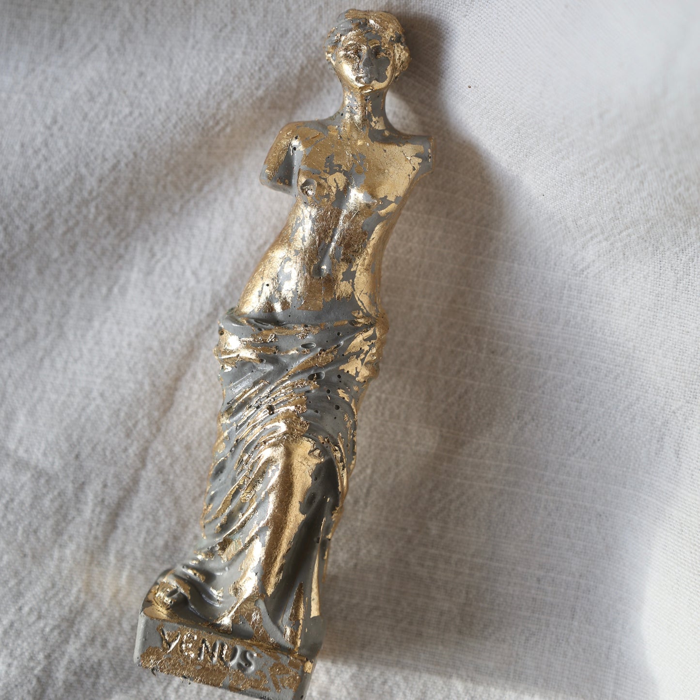 Gold-accented Venus by Lily Glow Decor figurine captured in soft natural light