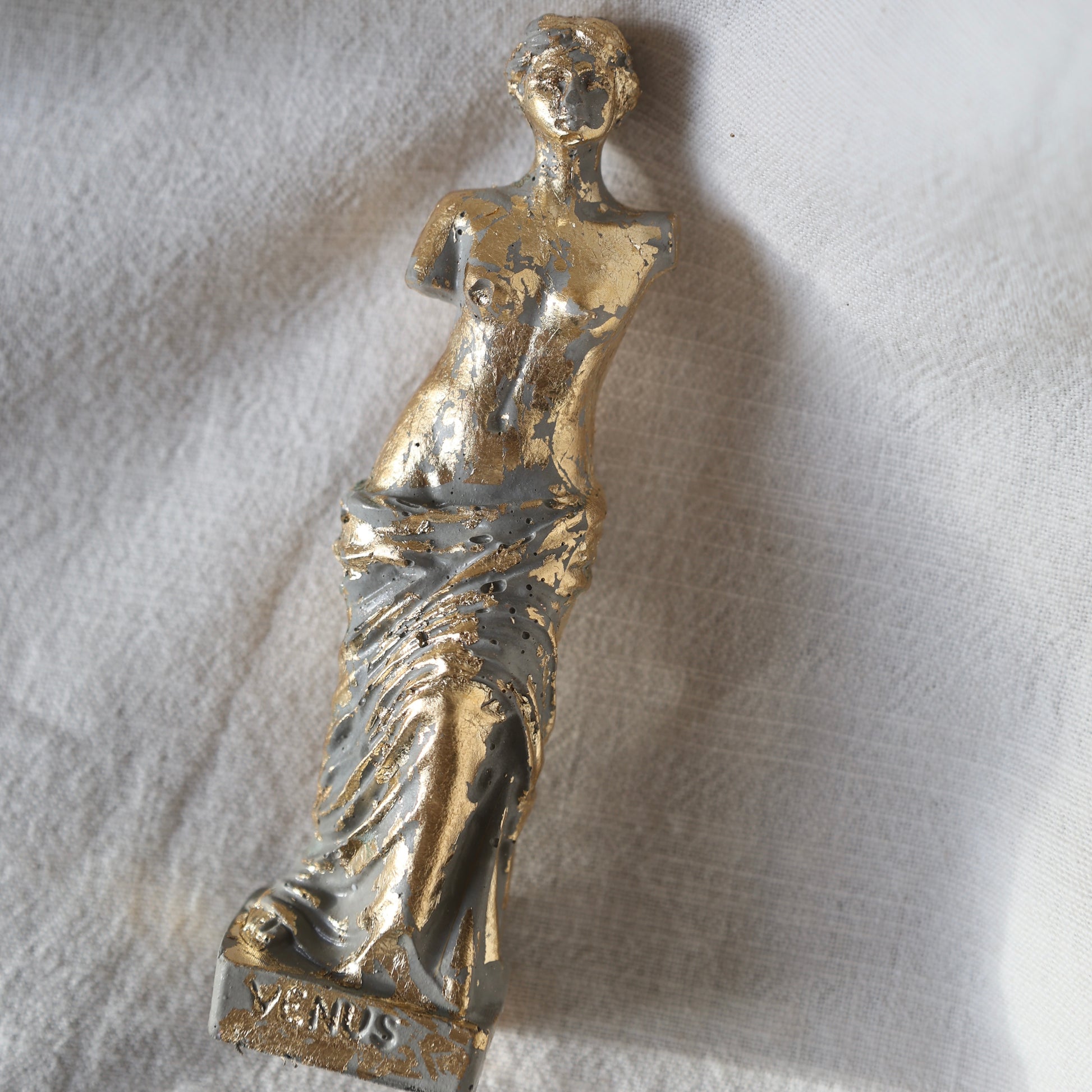 Gold-accented Venus by Lily Glow Decor figurine captured in soft natural light