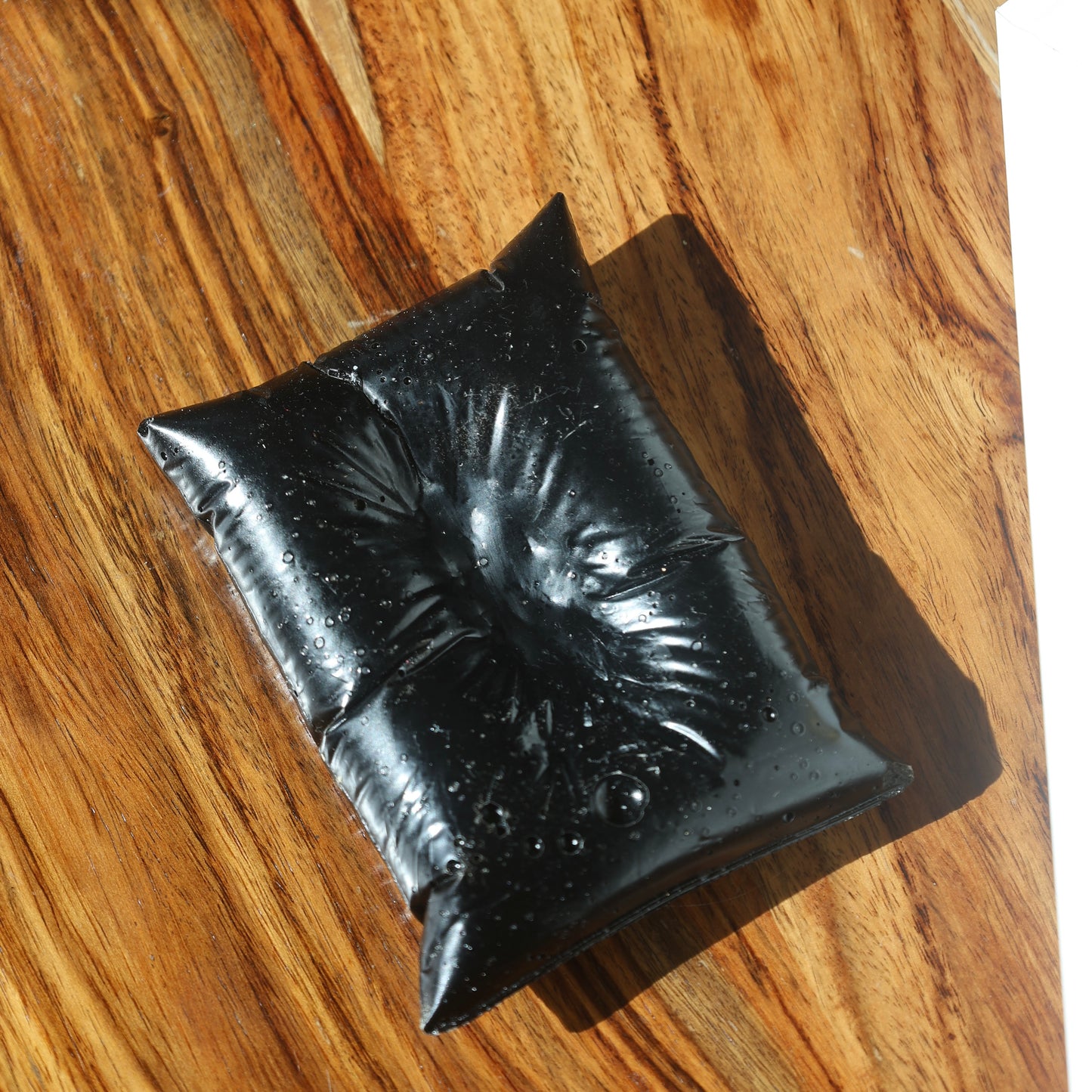 Modern black pillow candleholder top view | Lily Glow Decor