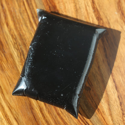 Modern black pillow candleholder top view | Lily Glow Decor