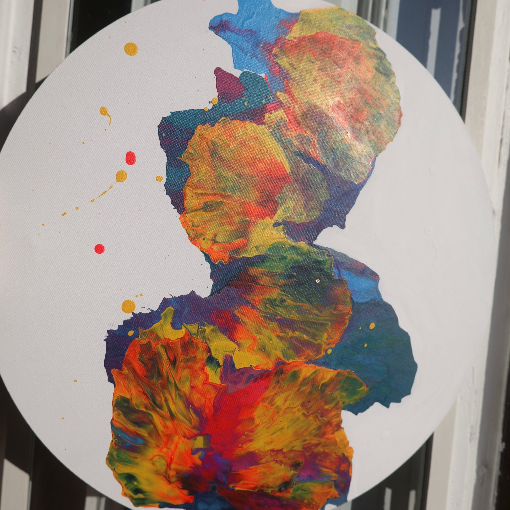 Round abstract painting with vivid red and yellow details | Lily Glow Home Decor