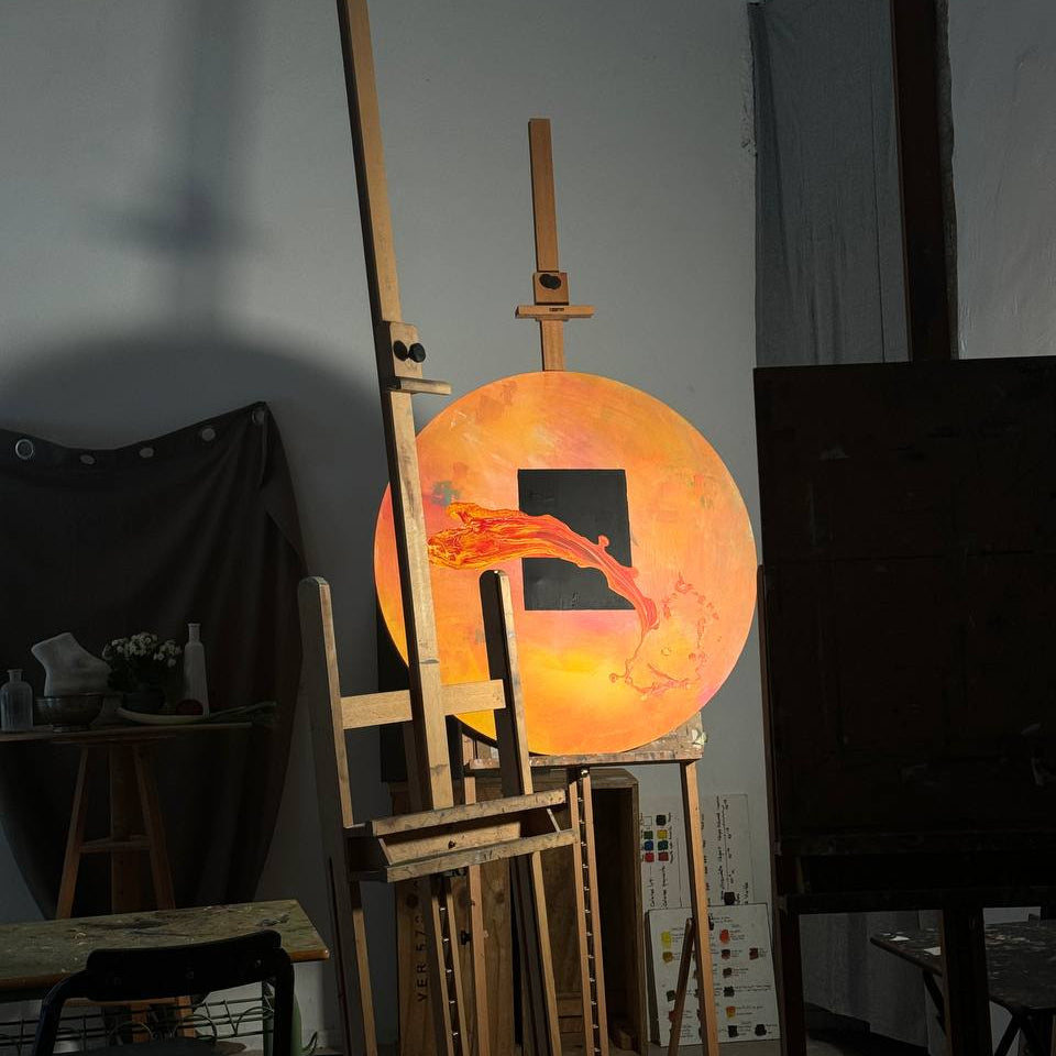Circular abstract painting with black square and red-orange motion by Lily Glow Decor