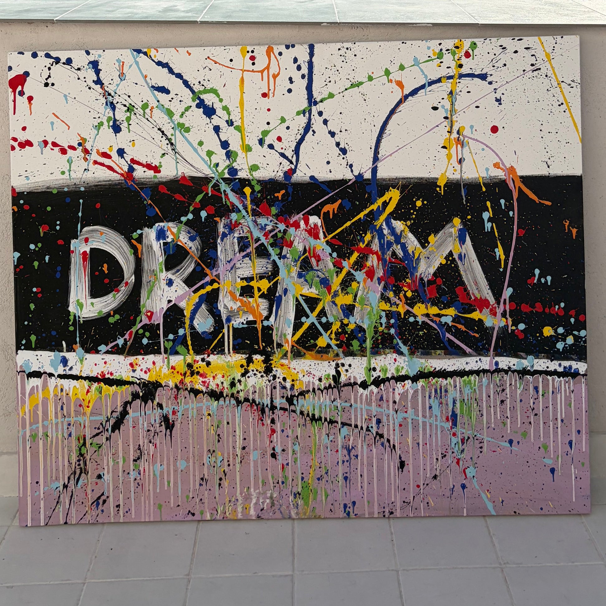 Large colorful abstract painting with word "DREAM" and bold splashes – Lily Glow Decor