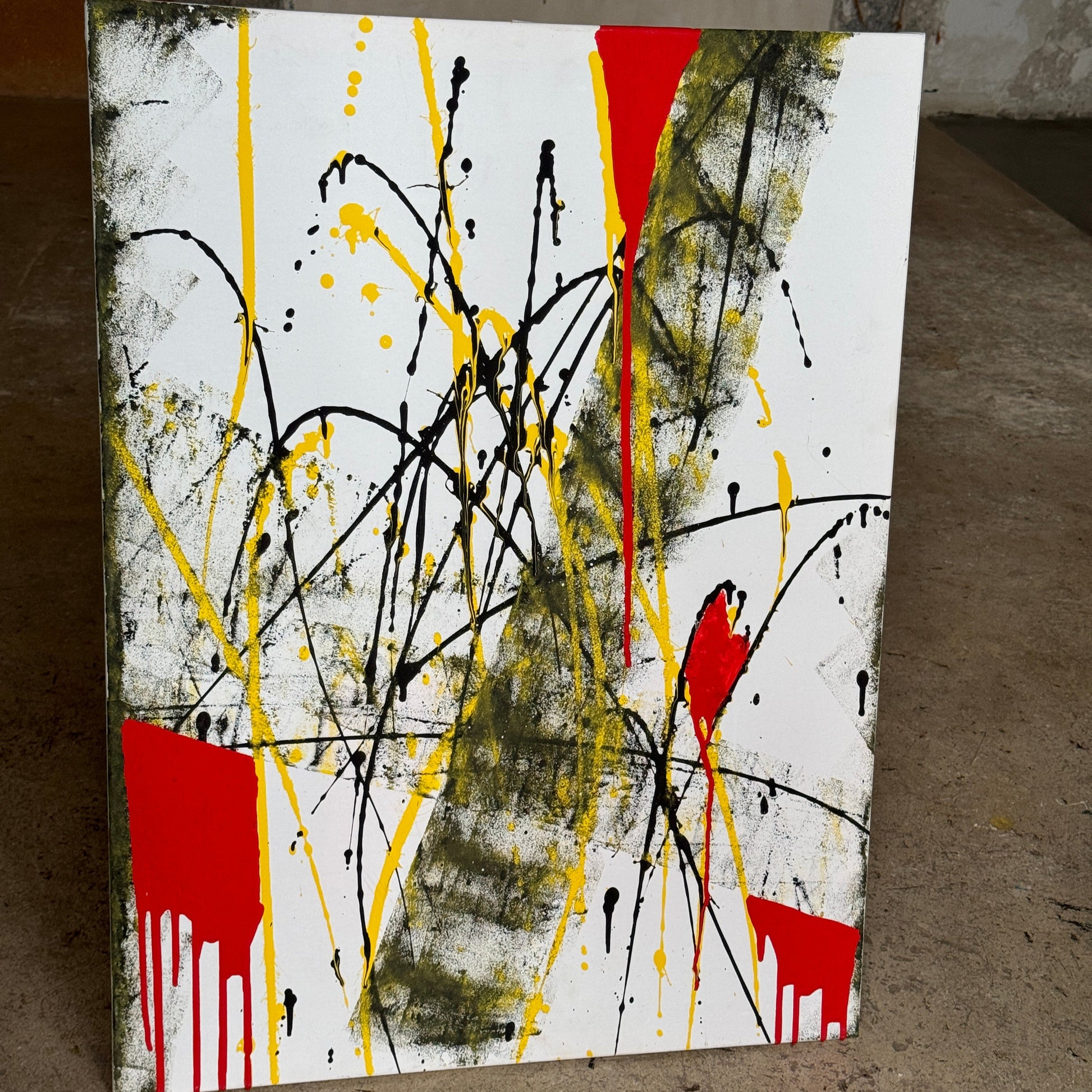 Abstract canvas with red, yellow and black splashes – Lily Glow Decor