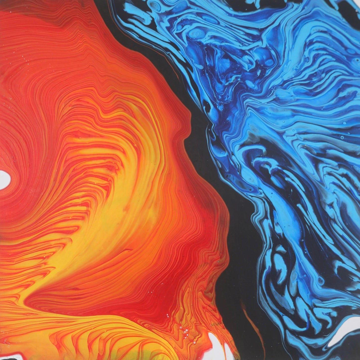 Abstract painting in red, yellow, and blue tones on canvas by Lily Glow Decor