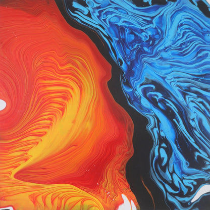 Abstract painting in red, yellow, and blue tones on canvas by Lily Glow Decor