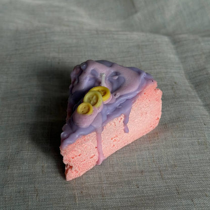 Whimsical cake slice candle in pink and purple colors by Lily Glow Home Decor