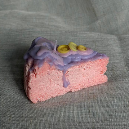 Whimsical cake slice candle in pink and purple colors by Lily Glow Home Decor