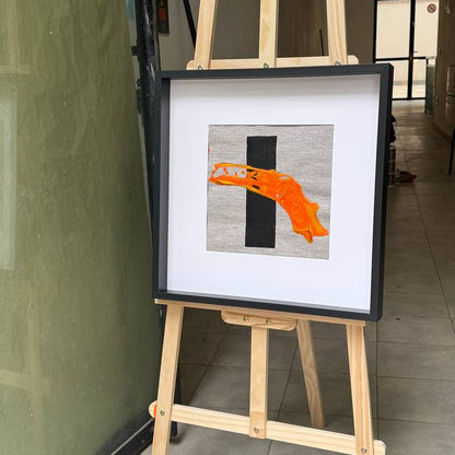 Framed abstract artwork with orange texture and black element Lily Glow Home Decor