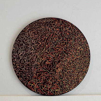 Round abstract painting with red and orange lines on dark background – Lily Glow Decor