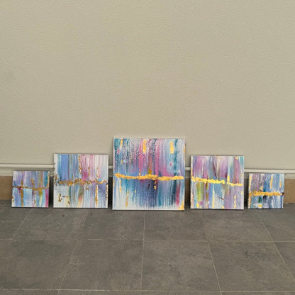 Five-piece abstract canvas wall art set with blue, lavender, white, and gold accents designed as a modern gallery wall composition by Lily Glow Decor