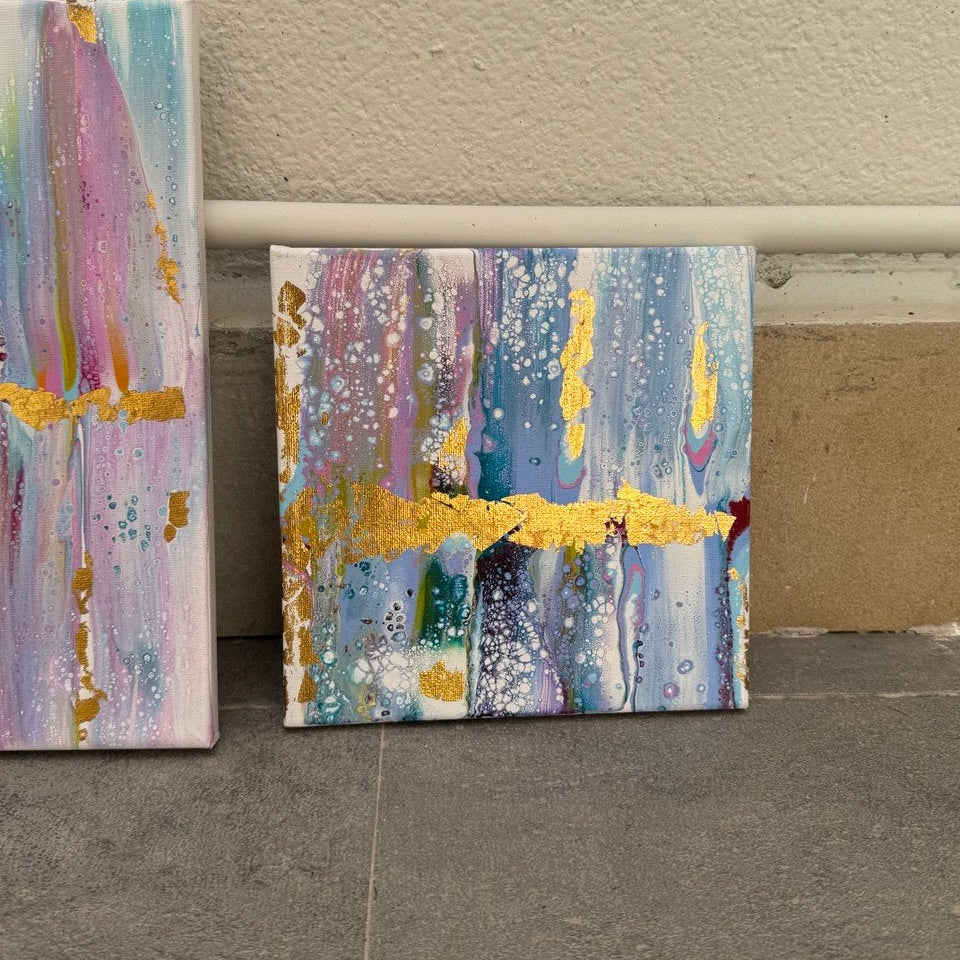 Five-piece abstract canvas wall art set with blue, lavender, white, and gold accents designed as a modern gallery wall composition by Lily Glow Decor