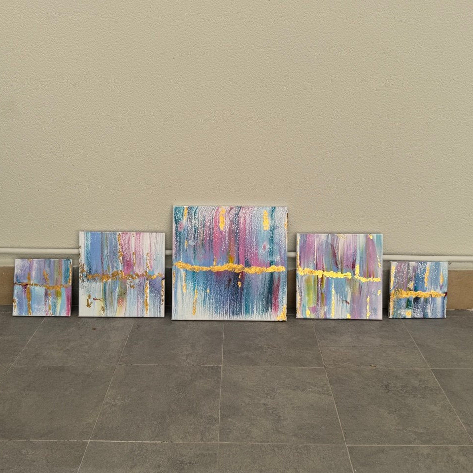 Five-piece abstract canvas wall art set with blue, lavender, white, and gold accents designed as a modern gallery wall composition by Lily Glow Decor