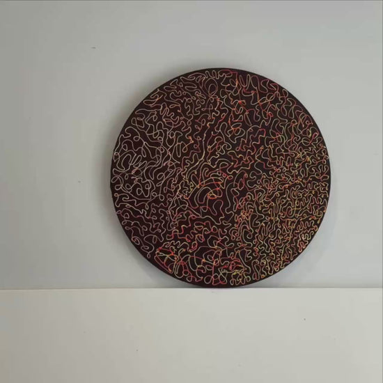 Round abstract painting with red and orange lines on dark background – Lily Glow Decor