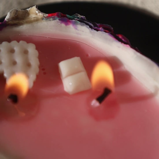 Round black candleholder with seashell candle by Lily Glow Decor